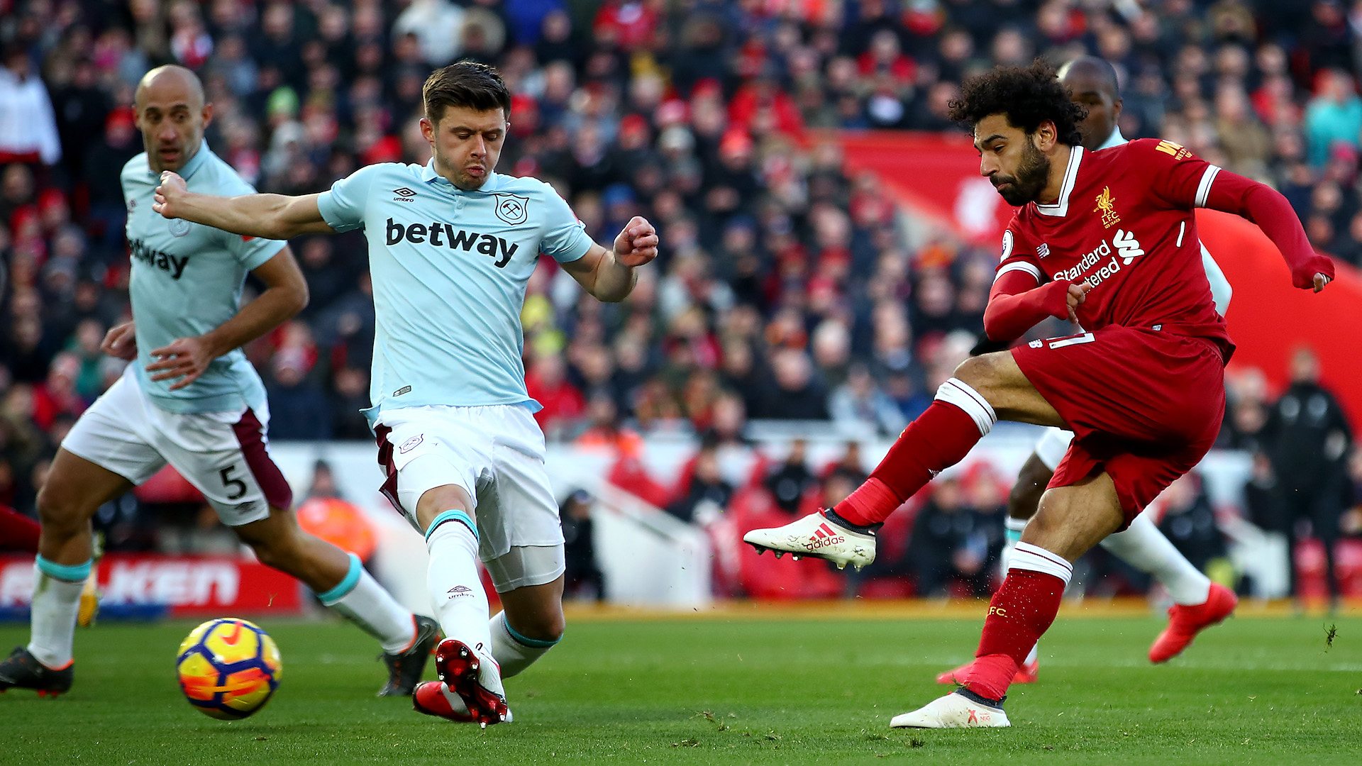 Mohamed Salah takes a shot in the Premier League