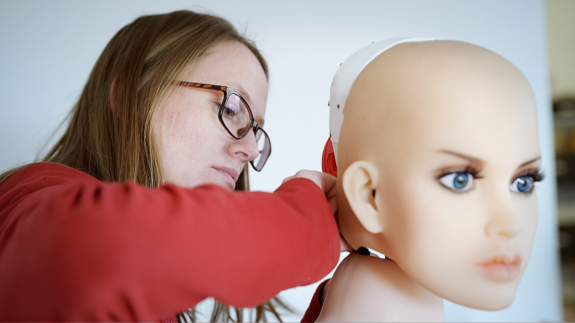 Maritsa Santos works on a sex robot