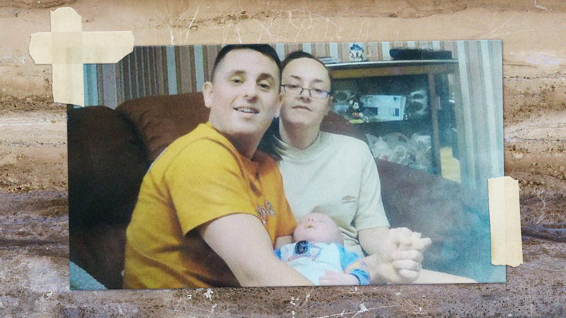 A photo of Mark with his wife and newborn baby