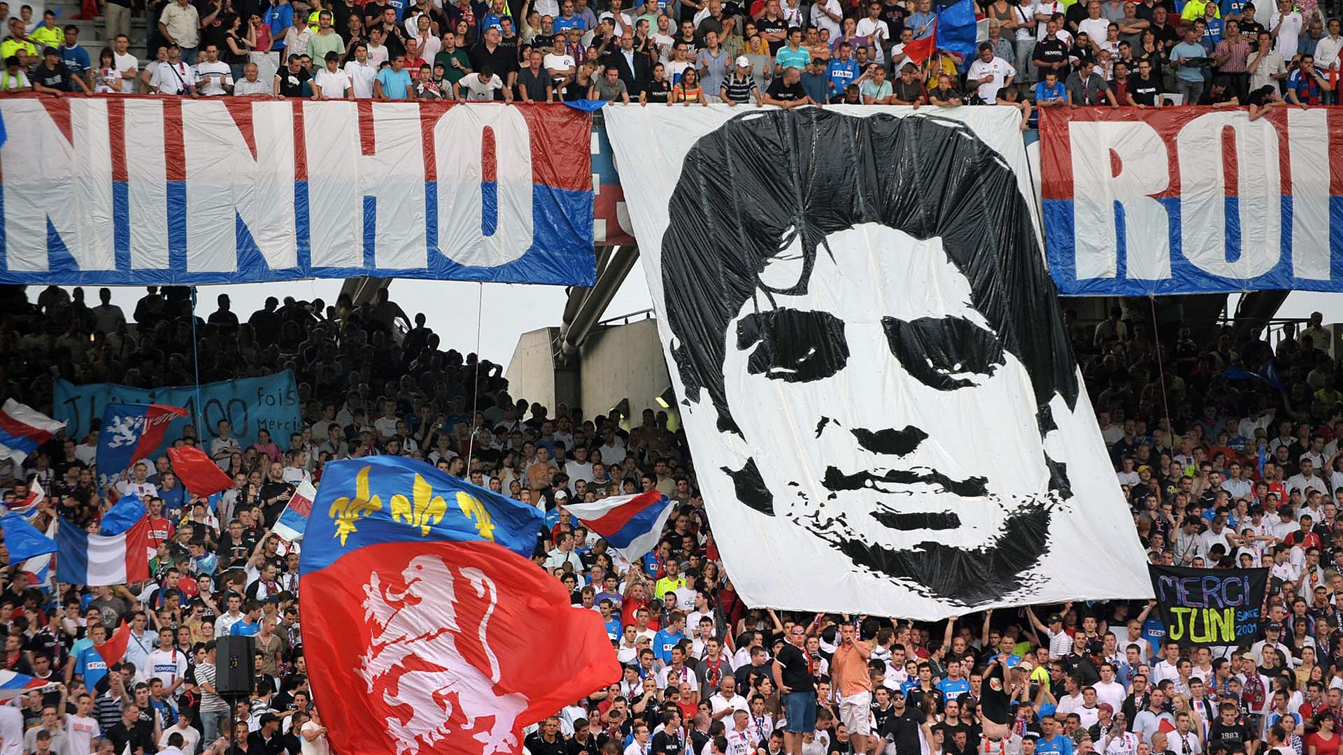 Lyon fans with a Juninho banner