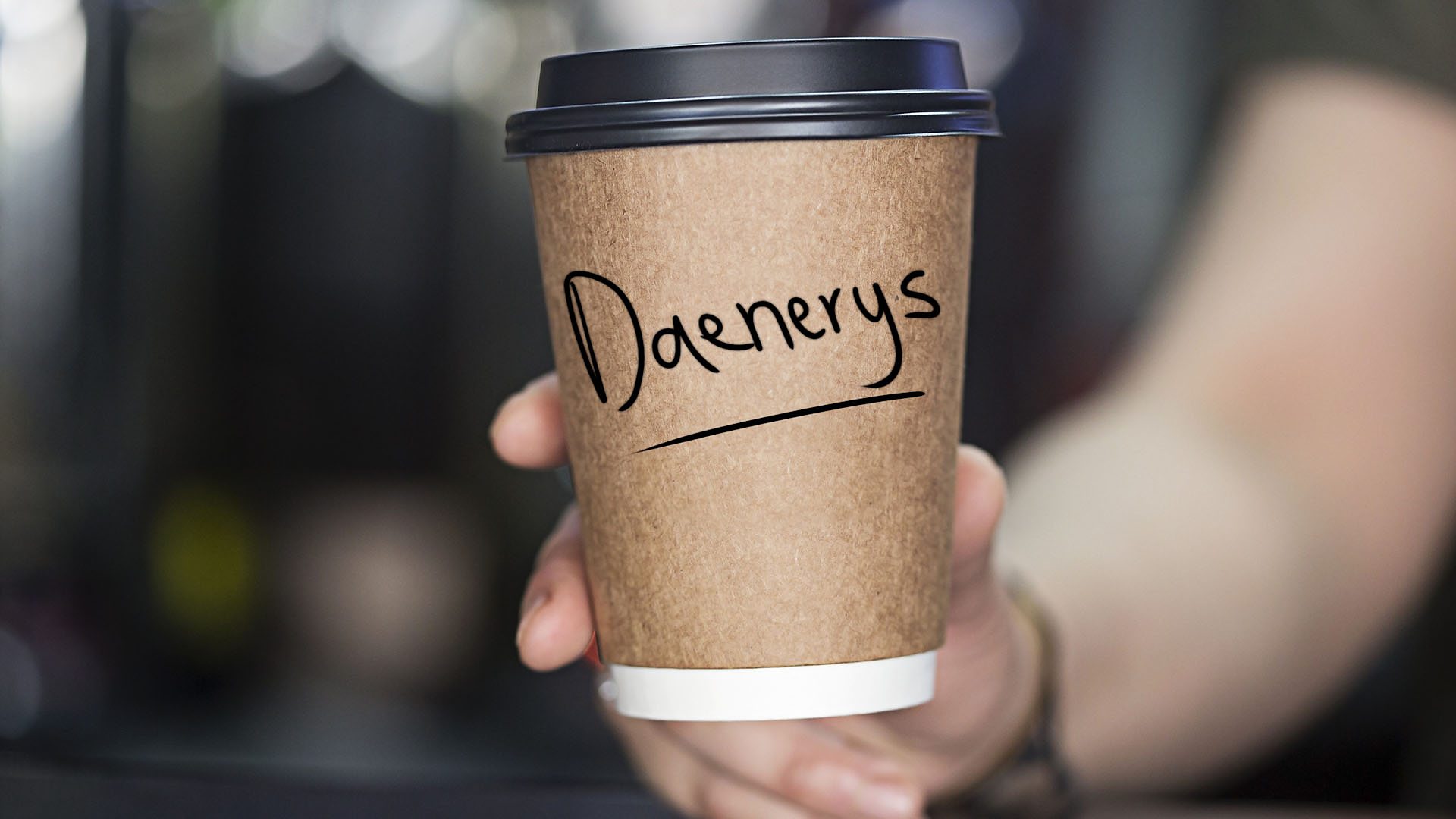 Takeaway coffee cup with Daenerys written on it
