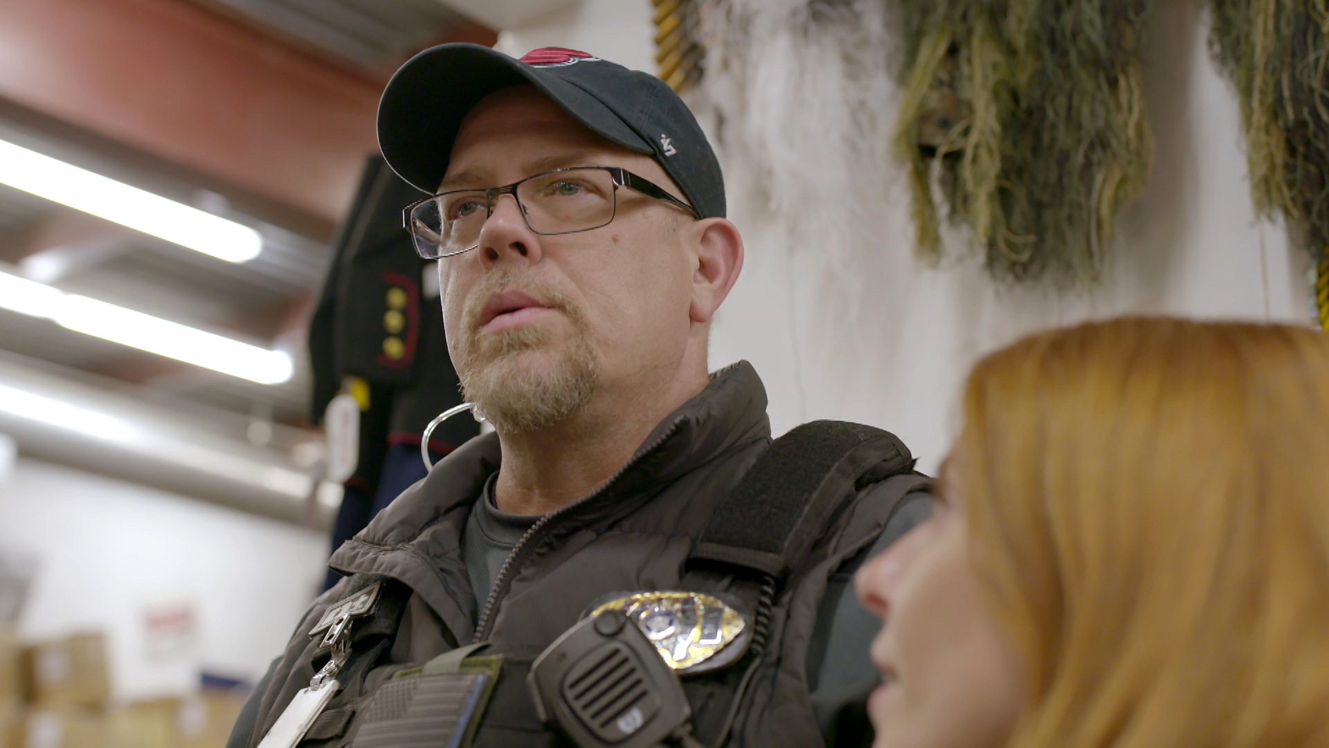 Stacey Dooley stands next to bounty hunter Scott Gribble
