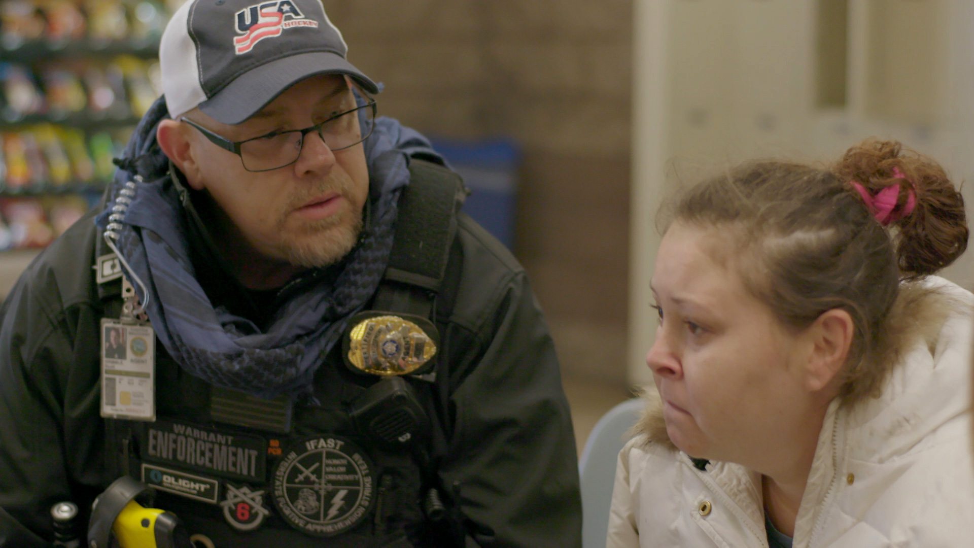 Bounty hunter waits with Keri at jail while details of her new bond are discussed