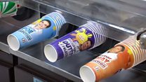 Customers in the Philippines "vote" for their favourite presidential candidates with fizzy drink cups