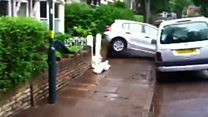 Birmingham flood lifts cars from road