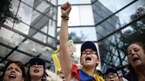 Mass rival protests in Venezuela