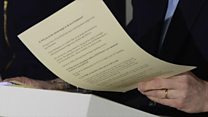 Secret papers keep getting caught on camera