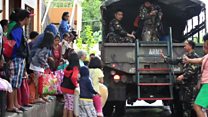 Evacuations in Philippines as typhoon strikes