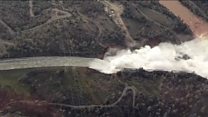 Aerials show force from US dam