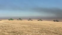 Iraqi forces go into battle to music