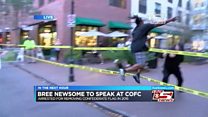 Airborne protester grabs Confederate flag
