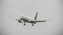 Moment plane aborts landing in wind