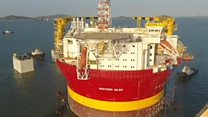 Huge oil rig starts China to UK journey