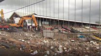 Football stadium demolition under way