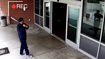 Police tackle bat-wielding man