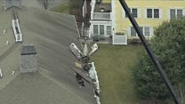 Plane removed from US roof
