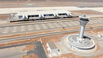 Why is Dakar's new airport 50km away?