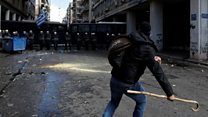Greek farmers attack police with crooks