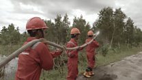 Damping down to fight peatland fires