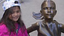Fearless Girl faces Wall Street bull