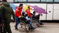 Syrian rebels and their families leave Homs