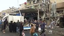 Baghdad market bomb kills at least 20