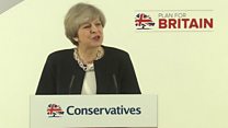 May pledges to protect workers' rights