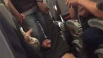 Man forcibly dragged off US flight