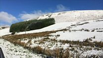 Snow falls at the end of April