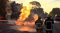 Fire erupts from road as gas main leaks