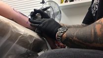 Tattoo artists etch out election hopes