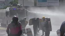 Venezuela protests: Tear gas and rocks fly
