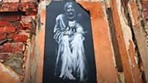 Artworks appear on derelict buildings