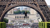 Riders brave Eiffel Tower zip wire