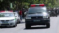 Security and ambulances at Iran's parliament