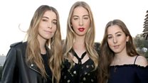 Haim explain how dinosaurs held up the follow-up to their debut album