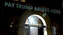 Who is behind the projections on the Trump Hotel?