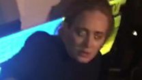 Adele visits London fire site