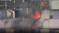 Flames still visible at tower, 36 hours on