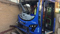 Guided bus crashes into wall