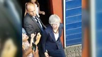 Theresa May booed at Grenfell visit