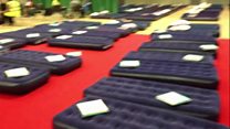 Air beds laid out in Swiss Cottage leisure centre