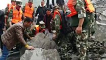 Many buried in China landslide