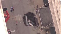Sinkhole swallows car in St Louis