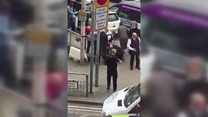 Moment police arrest man with machete