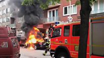 G20: Burning vehicles and water cannons