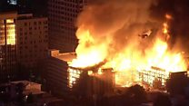 Massive fire engulfs blocks of flats
