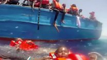 Child migrants in sea pulled to safety