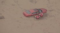 Man rescued from flooded car