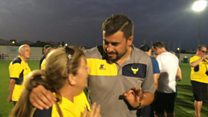 Oxford fans on pitch in Portugal